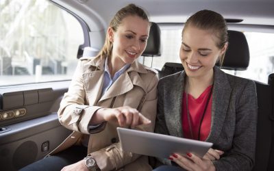 Discuss business strategy while driving to a meeting