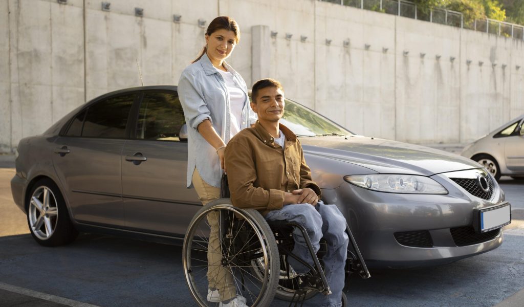 full-shot-woman-man-wheelchair