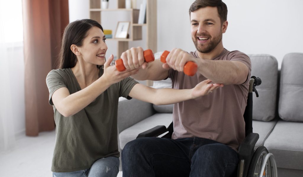 young-adult-helping-disabled-friend